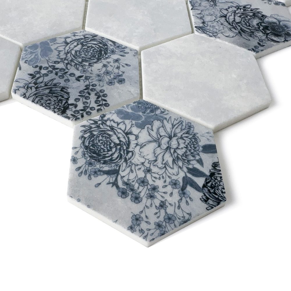 Close-up of HexaFusion Botanica Meadow Lark matte pressed glass 3 inch hexagon mosaic with floral pattern