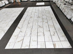 18x18 calacatta gold Italian Marble-patterned tiles on a floor