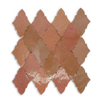 Butterfly zellige mosaic sheet close-up showing multi-tone terracotta variation and handmade texture