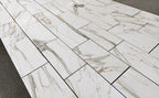 Calacatta Gold Italian Marble-12x24 patterned tiles on a floor