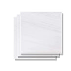 Stacked Aria Bianco Dolomite 12x12 marble tiles showing consistent color range and natural variation across pieces.
