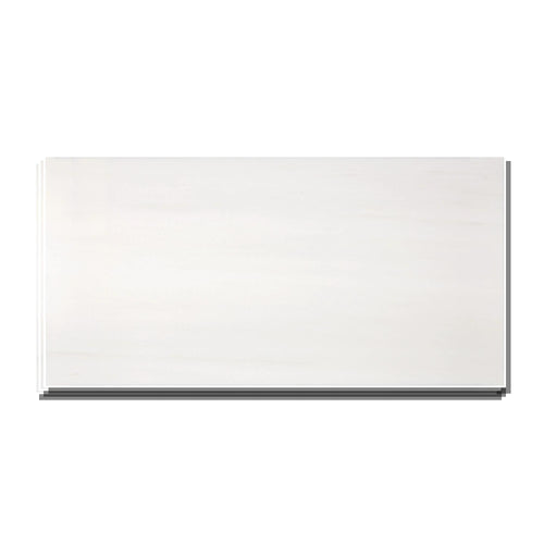 Stacked Aria Bianco Dolomite 12x24 marble tiles showing consistent color range and natural variation across pieces.