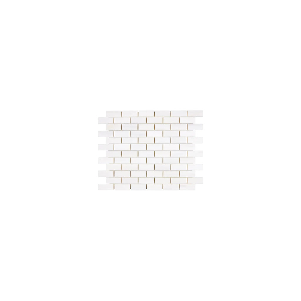 Aria Bianco Dolomite marble mosaic 1x2 brick, square studio image of a mounted sheet with subtle veining and soft tone variation.