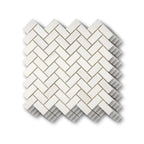 Stacked Aria Bianco Dolomite 1x2 herringbone marble mosaic sheets showing consistent color range and natural variation.