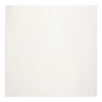Close-up of Aria Bianco Dolomite marble tile showing fine veining, gentle movement, and natural stone variation.