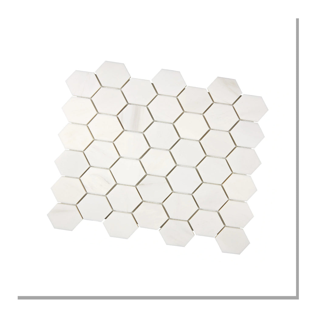 Angled view of Aria Bianco Dolomite 2-inch hexagon marble mosaic sheet highlighting the hex pattern and soft veining.