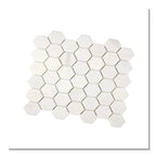 Angled view of Aria Bianco Dolomite 2-inch hexagon marble mosaic sheet highlighting the hex pattern and soft veining.