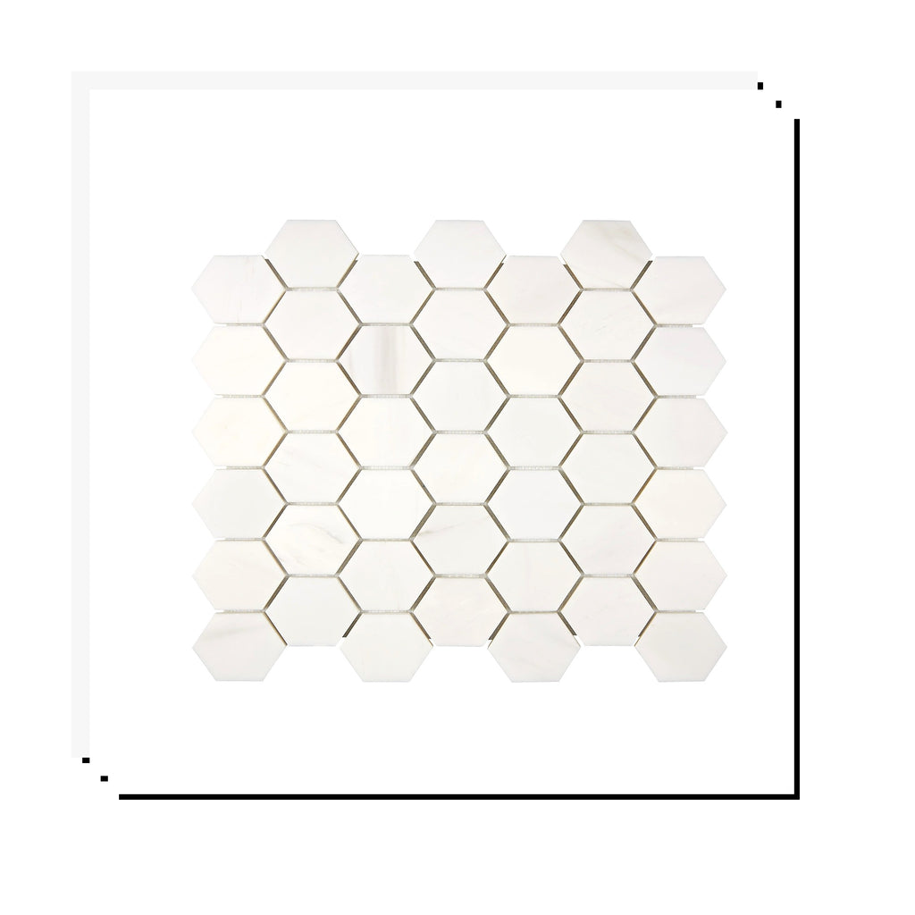 Stacked Aria Bianco Dolomite 2-inch hexagon marble mosaic sheets showing consistent color range and natural variation.