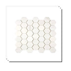 Stacked Aria Bianco Dolomite 2-inch hexagon marble mosaic sheets showing consistent color range and natural variation.
