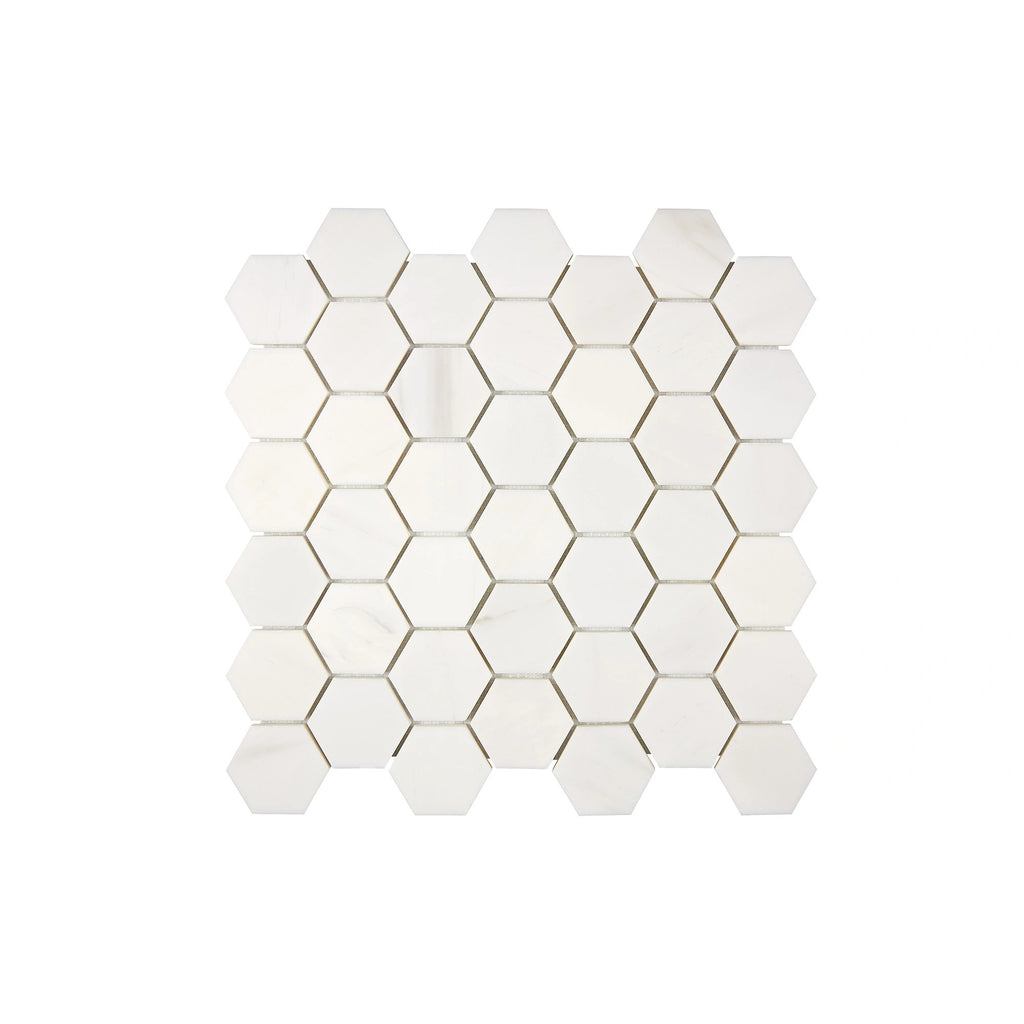 Aria Bianco Dolomite marble mosaic 2-inch hexagon, square studio image of a mounted sheet with subtle veining and tone variation.