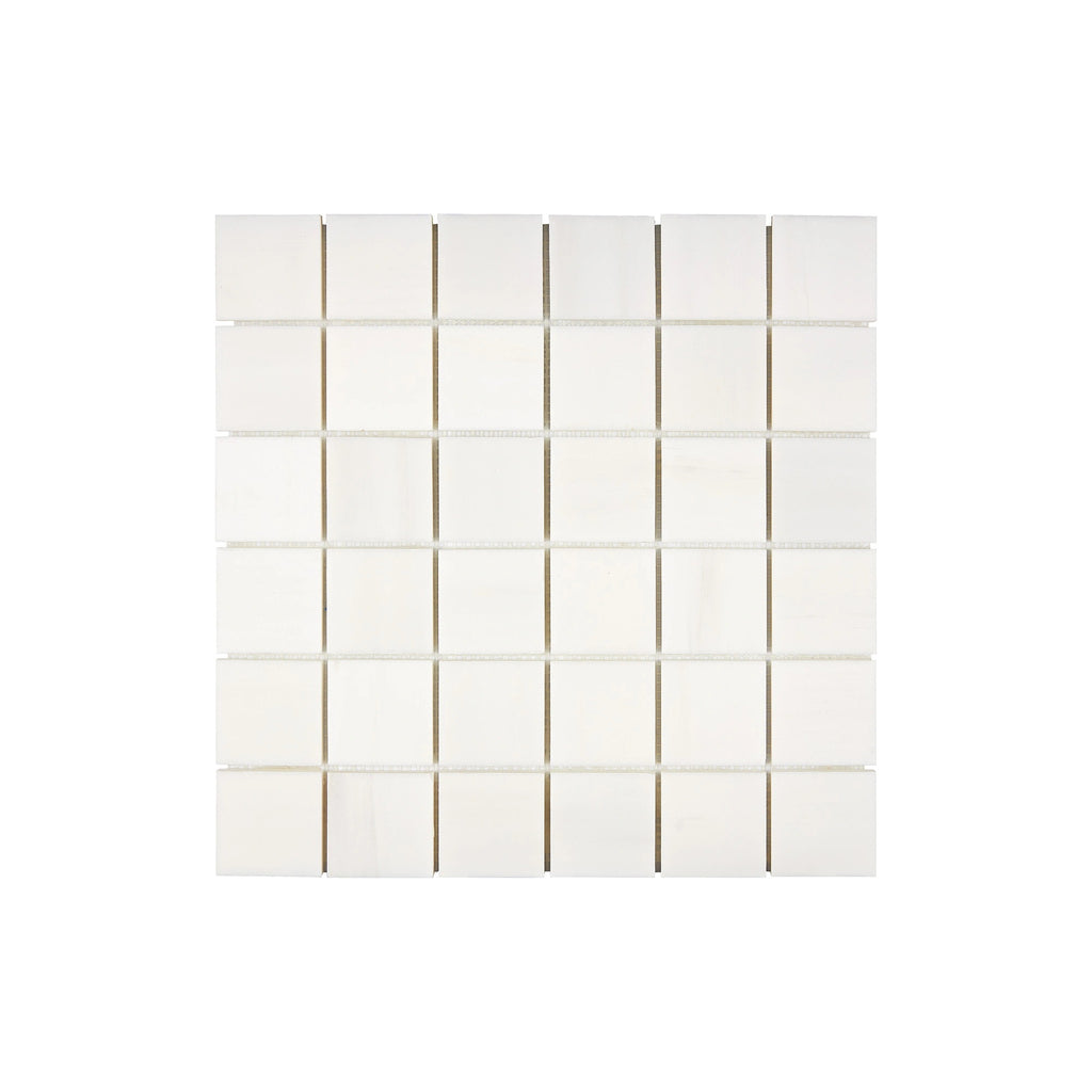 Aria Bianco Dolomite marble mosaic 2x2, square studio image of a mounted sheet with subtle veining and soft tone variation.