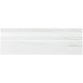 Aria Bianco Dolomite marble baseboard trim, studio image showing a white stone profile with soft natural veining and a shaped edge detail.
