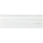 Aria Bianco Dolomite marble baseboard trim, studio image showing a white stone profile with soft natural veining and a shaped edge detail.