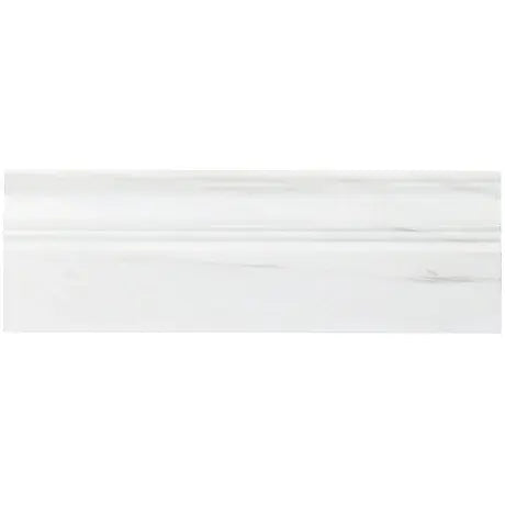 Aria Bianco Dolomite marble baseboard trim, studio image showing a white stone profile with soft natural veining and a shaped edge detail.