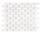 Aria Bianco Dolomite marble mosaic 1x2 brick, studio image of a mounted sheet showing subtle natural veining and soft tone variation.