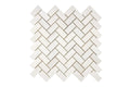 Aria Bianco Dolomite marble mosaic 1x2 brick, studio image of a mounted sheet showing subtle natural veining and soft tone variation.