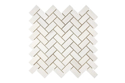 Aria Bianco Dolomite marble mosaic 1x2 brick, studio image of a mounted sheet showing subtle natural veining and soft tone variation.
