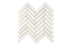 Aria Bianco Dolomite marble mosaic 1x4 herringbone, studio image of a mounted sheet showing subtle natural veining and soft tone variation.