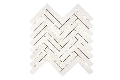 Aria Bianco Dolomite marble mosaic 1x4 herringbone, studio image of a mounted sheet showing subtle natural veining and soft tone variation.