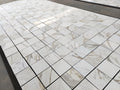 calacatta gold 12x12 marble tiles dry-lay for inspection and final project approval
