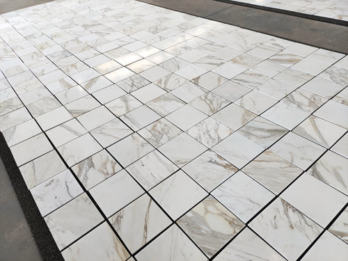 calacatta gold 12x12 marble tiles dry-lay for inspection and final project approval