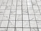 artepierre' s aria calacatta gold 12x12 Marble-patterned tiles arranged in a grid
