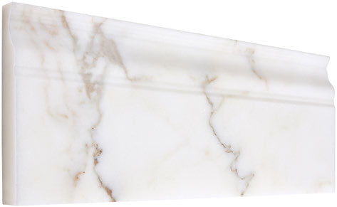 Aria Calacatta Gold marble baseboard trim, studio image showing a molded white marble profile with warm gold veining and subtle gray movement for wall-to-floor transitions.