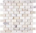Aria Calacatta Gold marble 1x2 brick mosaic sheet, studio image showing a bright white background with warm gold veining and subtle gray movement across the mounted pattern.