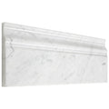 Aria Carrara White marble baseboard trim, studio image showing a molded bright-white marble profile with soft gray veining for clean wall-to-floor transitions.