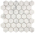 Aria Carrara White marble 2-inch hexagon mosaic sheet, studio image showing bright white stone with soft gray veining and natural variation across the mounted hex pattern.