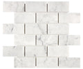 Aria Carrara White marble 2x4 brick mosaic sheet, studio image showing bright white stone with soft gray veining and natural variation across the mounted pattern.
