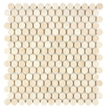 Aria Crema Marfil marble penny round mosaic sheet, studio image showing warm beige round chips with gentle movement and natural variation for shower floors, niches, and classic accents.