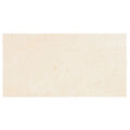 Aria Crema Marfil marble tile 12x24, studio image showing warm beige tone with gentle movement and natural variation for elegant floors, shower walls, and classic backsplashes.