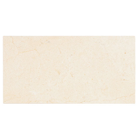 Aria Crema Marfil marble tile 12x24, studio image showing warm beige tone with gentle movement and natural variation for elegant floors, shower walls, and classic backsplashes.