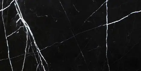 Aria Nero Marquina black marble tile 12x24, studio image showing deep black stone with bold white veining and natural high-contrast variation for dramatic walls, floors, and statement surfaces.