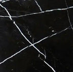 Aria Nero Marquina black marble tile 18x18, studio image showing deep black stone with bold white veining and natural high-contrast variation
