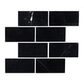 Aria Nero Marquina black marble subway tile 3x6, studio image showing deep black stone with bold white veining and natural high-contrast variation for dramatic backsplashes, shower walls, and accent areas.