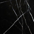 Aria Nero Marquina black marble tile 4x4, studio image showing deep black stone with bold white veining and natural high-contrast variation for graphic backsplashes, shower walls, and accent areas.