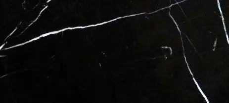Aria Nero Marquina black marble tile 6x12, studio image showing deep black stone with bold white veining and natural high-contrast variation for statement walls, floors, and backsplashes.