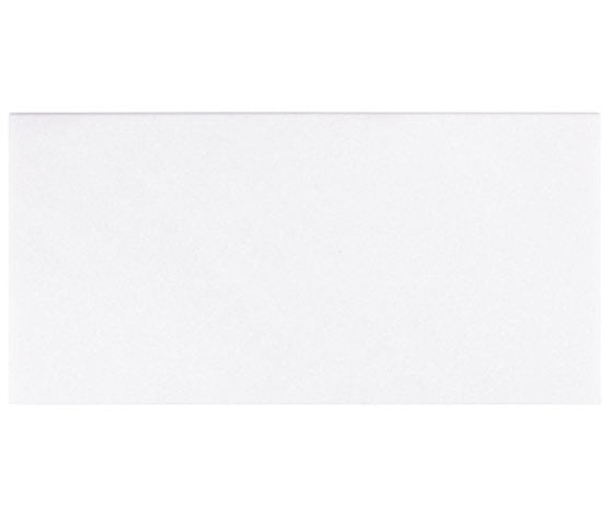 Aria Thassos White marble tile 12x24, studio image showing a crisp bright-white surface with minimal movement for clean shower walls, spa bathrooms, and seamless modern floors.