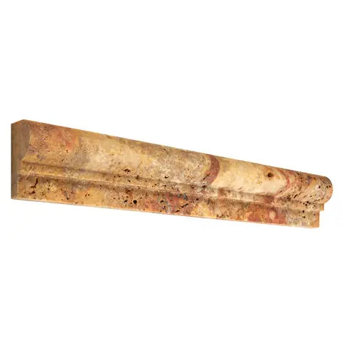 Forum Terra Autumn Leaves (Scabos) travertine ogee chair rail liner, studio image showing a molded multi-tonal profile with warm creams, tans, and earthy accents plus natural pores and variation for decorative borders and wall transitions.