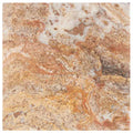 Forum Terra Autumn Leaves (Scabos) travertine tile 12x12 filled and honed, studio image showing sun-baked creams, tans, and earthy accents with a smoother filled surface and rich natural variation for warm floors, shower walls, and welcoming interiors.