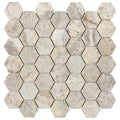 Forum Terra Grigio silver travertine 2-inch hexagon mosaic sheet tumbled, studio image showing cool gray tones with natural pores, softened edges, and subtle variation for shower floors and modern wet-area accents.