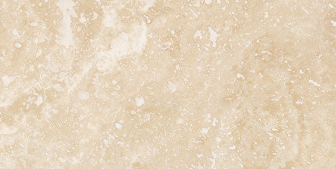Forum Terra Ivory travertine tile 12x24 honed, studio image showing warm ivory-beige tone with natural pores and quiet variation for relaxed floors, shower walls, and timeless interiors.