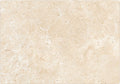 Forum Terra Ivory travertine tile 16x24 tumbled antiqued, studio image showing warm ivory-beige tone with natural pores, softened edges, and quiet variation for relaxed floors, entryways, and timeless interiors.