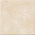 Forum Terra Ivory travertine tile 6x6 tumbled, studio image showing warm ivory-beige tone with natural pores, softened edges, and quiet variation for rustic backsplashes, shower walls, and timeless accents.