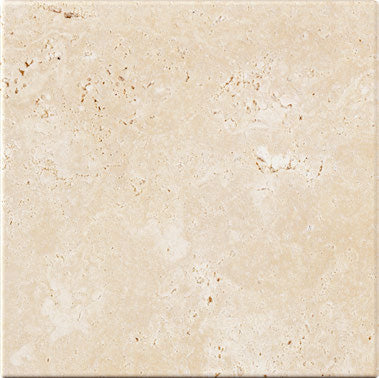Forum Terra Ivory travertine tile 6x6 tumbled, studio image showing warm ivory-beige tone with natural pores, softened edges, and quiet variation for rustic backsplashes, shower walls, and timeless accents.