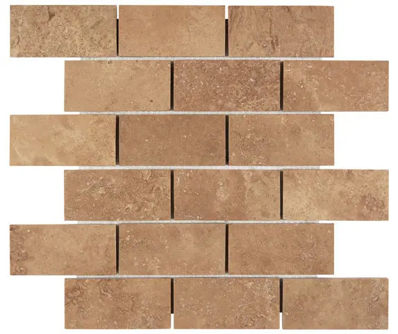Forum Terra Umber travertine 2x4 brick mosaic sheet honed and filled, studio image showing rich warm brown tones with a smoother filled surface, natural variation, and subtle pore character for shower floors and accents.