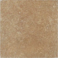 Forum Terra Umber travertine tile 12x12 tumbled, studio image showing rich warm brown tone with natural pores, softened edges, and subtle variation for rustic floors, shower walls, and timeless interiors.