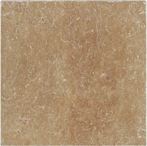 Forum Terra Umber travertine tile 18x18 tumbled, studio image showing rich warm brown tone with natural pores, softened edges, and subtle variation for rustic floors, shower walls, and timeless interiors.